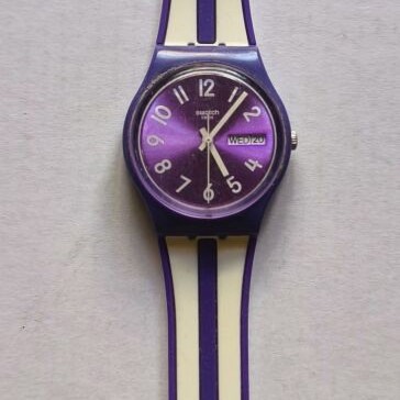 Swatch Nuora Gelso GV701 watch used, purple and white