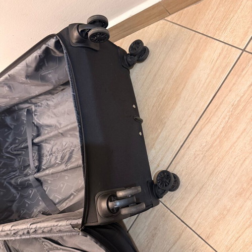Large wheeled travel suitcase like new, black