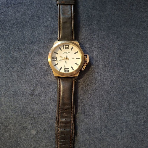 Oozoo unisex wristwatch used, gold color