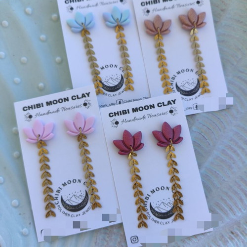 Lotus earrings new, burgundy with steel chain