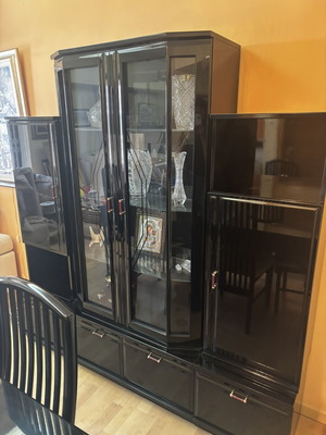 Multipurpose showcase used with drawers and glass doors
