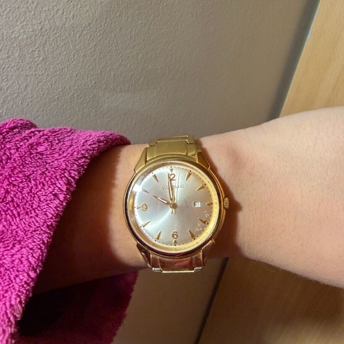 Vogue watch used, gold color with scratches