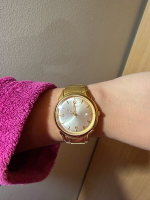 Vogue watch used, gold color with scratches