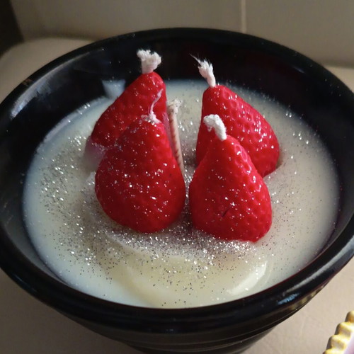 Handmade soy candle with strawberry scent