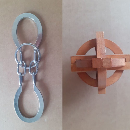 Metal and wooden puzzle like new, set of 2 pieces