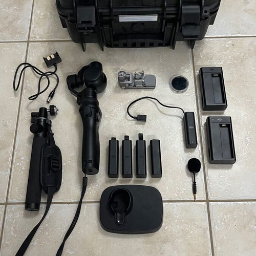 Dji Osmo 4K like new with 4 batteries and professional case