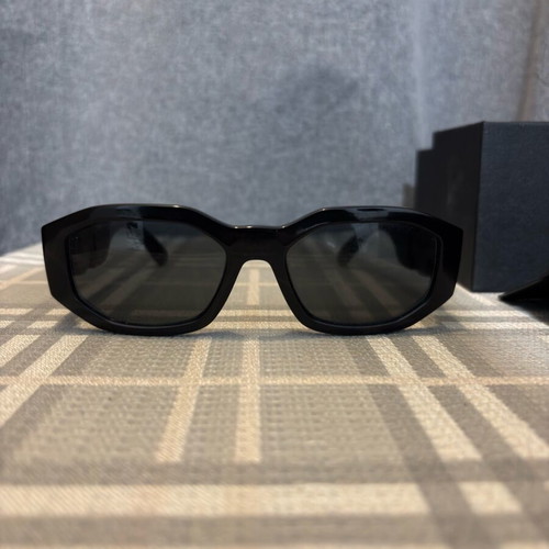 Versace sunglasses for women like new, black and gold