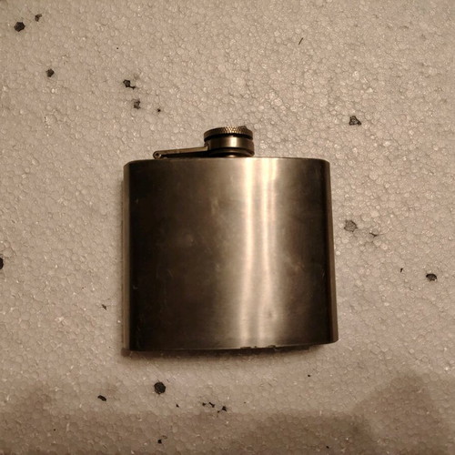 Vintage metal flask restored