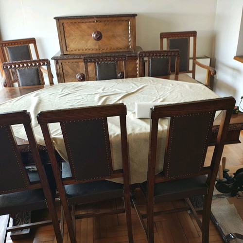 Old table with chairs and other furniture like new