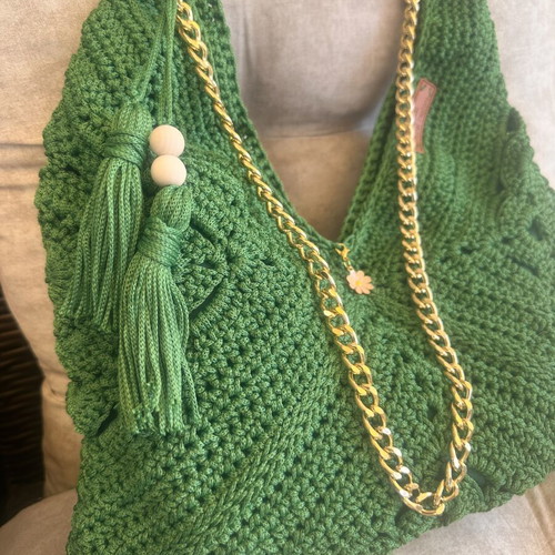 Handmade green shoulder bag with gold chain and decorative tassels