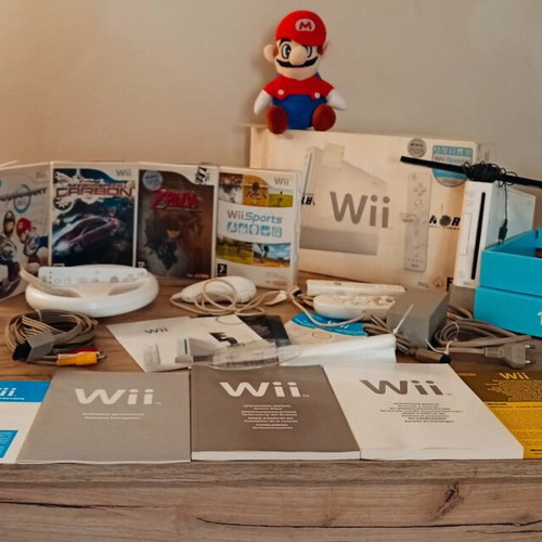 Nintendo Wii Collector Bundle with Zelda, Mario Kart, Wii Sports, NFS