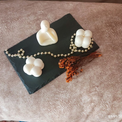 Decorative set with handmade soy candles and natural black stone platter