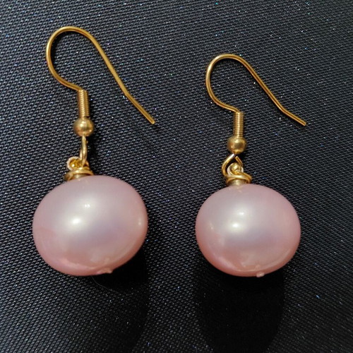 Handmade pink pearl earrings with gold hooks