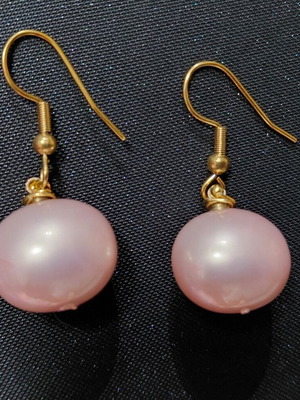 Handmade pink pearl earrings with gold hooks