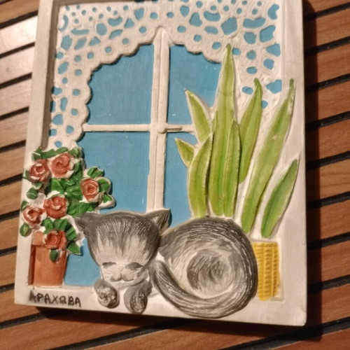 Clay embossed wall frame used, Arachova