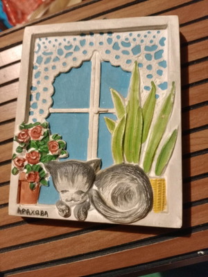 Clay embossed wall frame used, Arachova