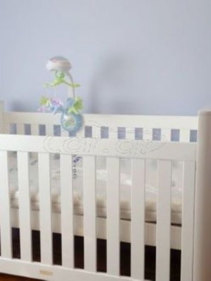 Trama convertible cot bed used with cocolatex mattress and mosquito net