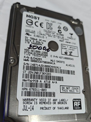 HGST 1TB твърд диск употребяван, 2.5" SATA III 6.0Gb/s за лаптоп или PS4
