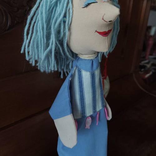 Handmade doll for collectors or puppet theatre on wooden base