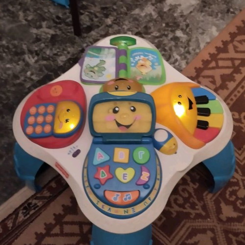 Fischer Price baby toy used, educational table with batteries