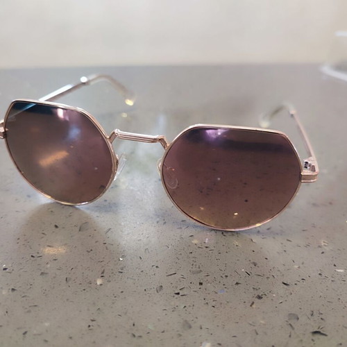 Hawkers unisex sunglasses used, rose gold