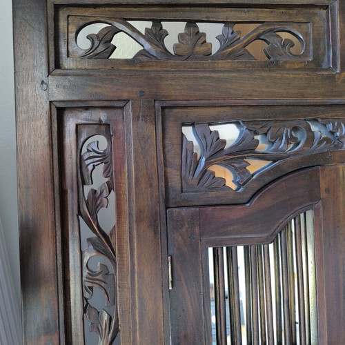 Wooden carved mirror with opening shutters like new