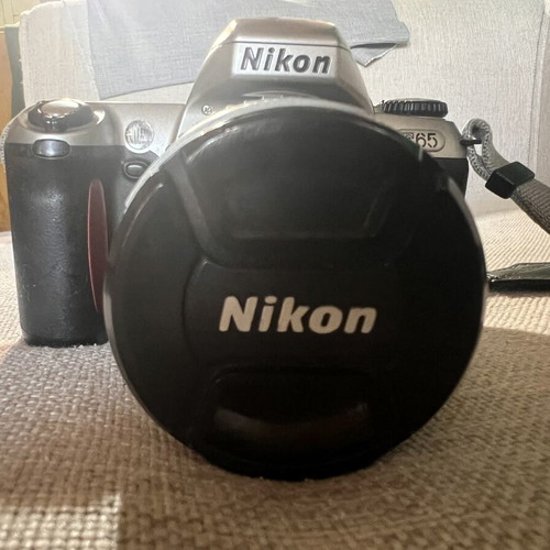 Nikon F65 SLR 35mm camera with AF Nikkor 28-80mm lens and Delsey case