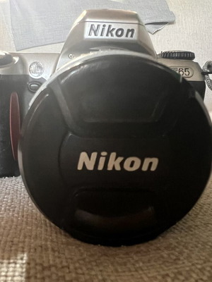 Nikon F65 SLR 35mm camera with AF Nikkor 28-80mm lens and Delsey case
