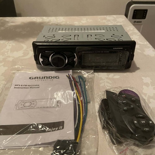 Grundig Automotive MP3 Radio Player new with remote control