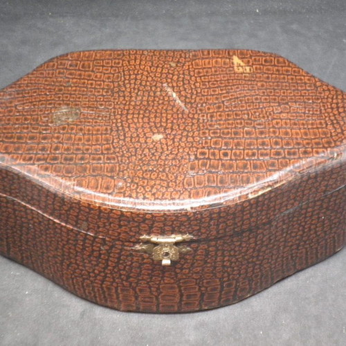 Antique jewelry box used, brown color with blue fabric interior