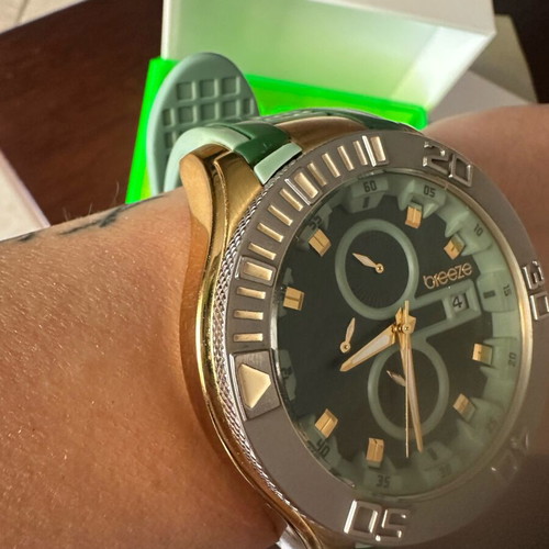 Breeze wristwatch used, green and gold unisex