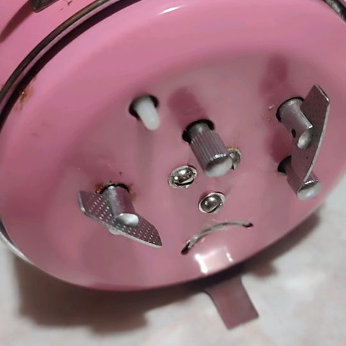 Five Rams table clock used, wind-up, pink