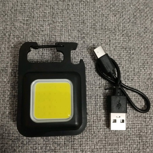 Mini LED Keychain with Three Flashlight Modes, Rechargeable, Magnet, and Opener