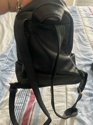 Backpack black used with 5 compartments