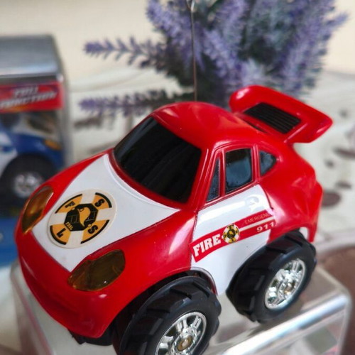 Electric toy cars with controllers, red and blue, sealed set of 2