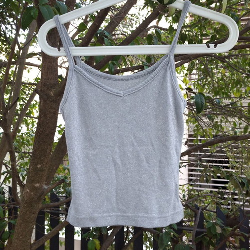 Silver blouse used, size Small, elastic fabric