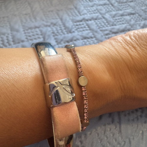 Bracelets pack of two, one collectible pink ribbon, used