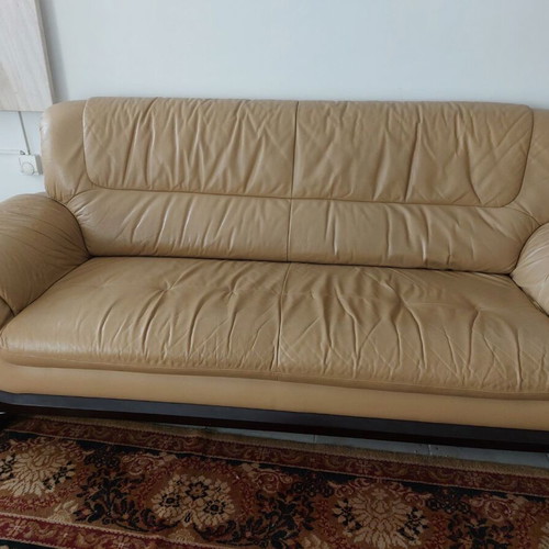 Living room furniture set with leather sofas, coffee table and TV unit