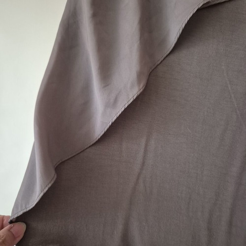 Blouse gray-beige elastic with gold detail and ruffle