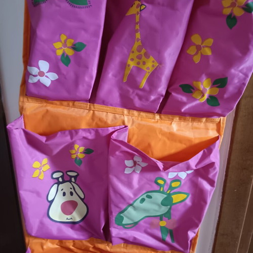 Children's storage pocket panel used