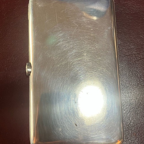 Silver cigarette case used with red stone and gold plating