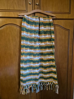 Handmade knitted scarf like new in green shades with fringes