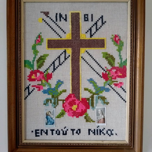 Hand-embroidered cross with wooden brown frame, like new