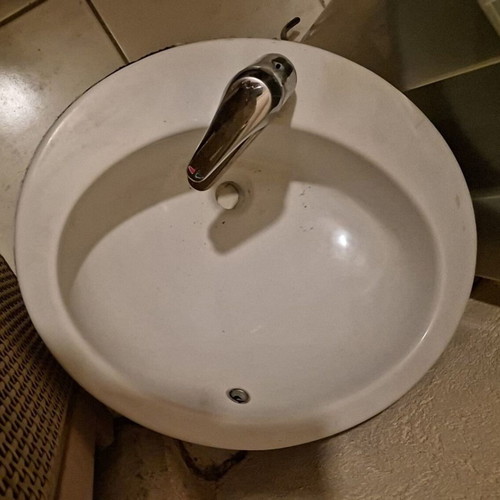 Kerasan sink used, oval white porcelain with faucet