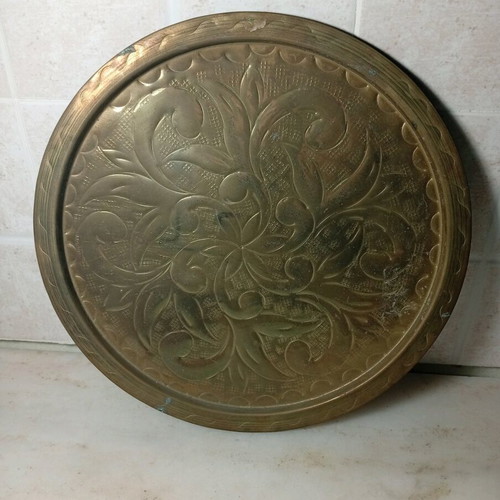 Brass carved tray like new with embossed patterns