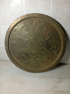Brass carved tray like new with embossed patterns