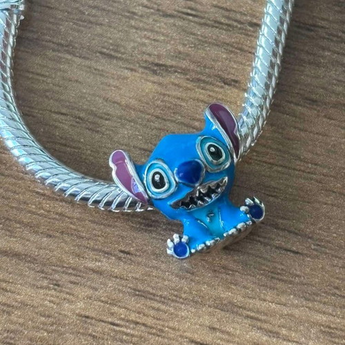 Pandora Stitch Charm like new, blue