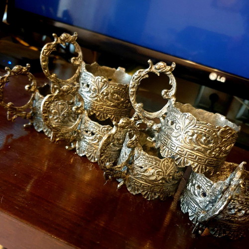 Vintage glass holders used with ornate design