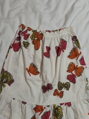 Set of 3 used girls' clothes with skirt, crop top and strapless blouse