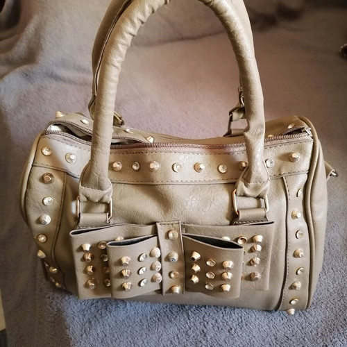 Handbag used with studs and double bow beige
